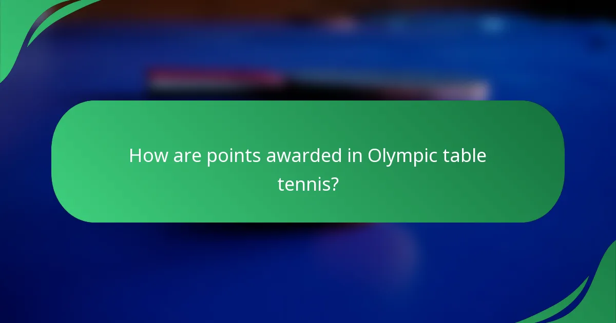 How are points awarded in Olympic table tennis?