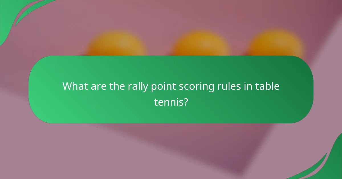 What are the rally point scoring rules in table tennis?