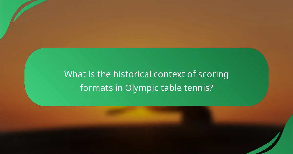 What is the historical context of scoring formats in Olympic table tennis?